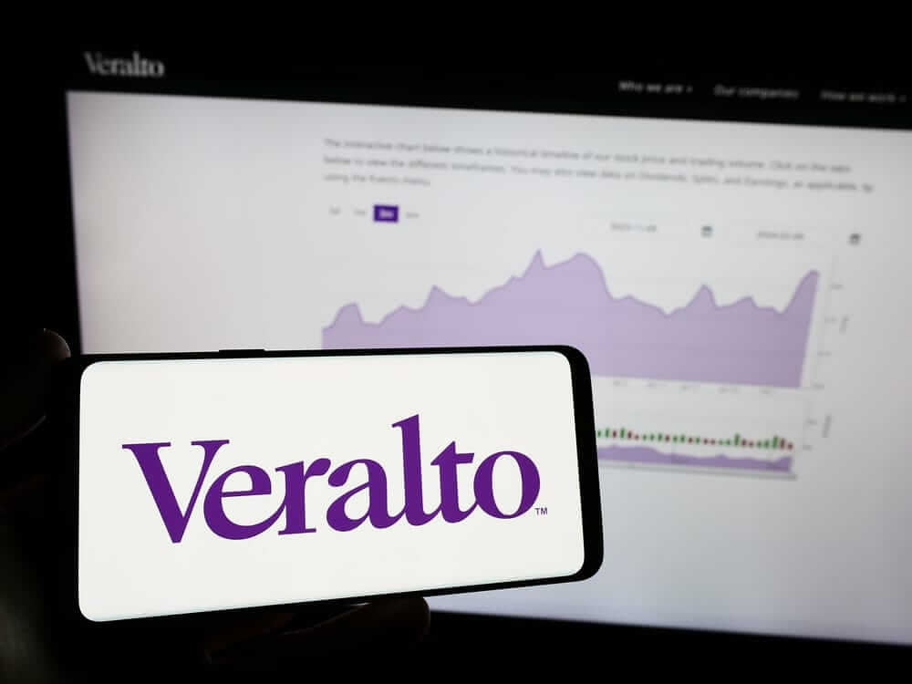 Veralto Corp logo on phone with chart-by T_Schneider via Shutterstock